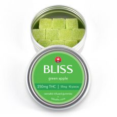 Green apple-flavored THC gummies with sugar crystals, stored in a silver tin labeled "Bliss" with 250mg THC