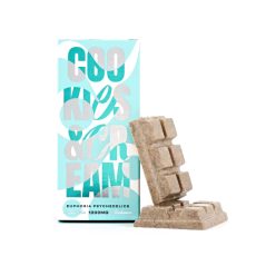 A white chocolate bar infused with 1200mg of psilocybin mushrooms, featuring a modern mint-colored package with bold lettering and a raised chocolate design.