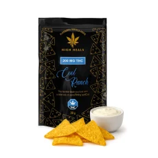 Front view of High Heals Cool Ranch Weed Chips bag surrounded by tortilla chips. The black bag displays '200 MG THC' and 'Cool Ranch' in blue text, with a cannabis warning symbol at the bottom. A bowl of ranch dip with a tortilla chip is visible