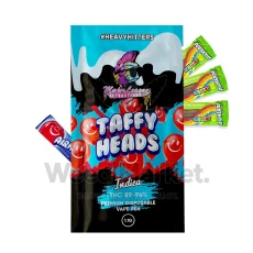 Packaging of Major League Extractions Taffy Heads disposable indica vape pen (1.1g) with images of colorful taffy candies.