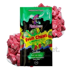 Major League Extractions Fruit Chews Watermelon-flavored Sativa disposable vape pen packaging, featuring illustrations of watermelon slices. The vape pen contains 89-94% THC and is labeled as a 1.1g premium disposable vape pen under the #HeavyHitters label.