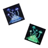 Two packages of MOTA Room 920 Magic Mushroom Tea, one in blue representing the lemon ginger flavor and the other in green for the Moroccan mint flavor, featuring illustrations of mushrooms on the front