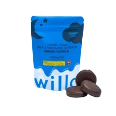 A blue bag of Willo cannabis-infused milk chocolate-covered creme cookies labeled for nighttime (indica), featuring a crescent moon and stars design. The package displays 500mg THC (5 cookies x 100mg each), with three chocolate-covered cookies placed beside it