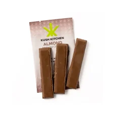 Kush Kitchen Almond chocolate bar broken into four pieces showing 200mg THC on branded brown packaging.