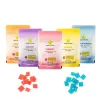 Kush Kitchen Hard Candy Variety Pack featuring orange, grape, cherry, lemon, and blue raspberry flavors in colorful packaging with THC 150mg, displayed with red and blue hard candy pieces on a white background.