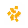 Orange hard candy pieces in a translucent golden hue on a white background