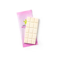 Unwrapped Kush Kitchen Strawberry THC Chocolate Bar White chocolate bar with strawberry bits resting on a pink wrapper