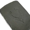 Close-up of Zen Hash showcasing its smooth texture and pressed leaf emblem.