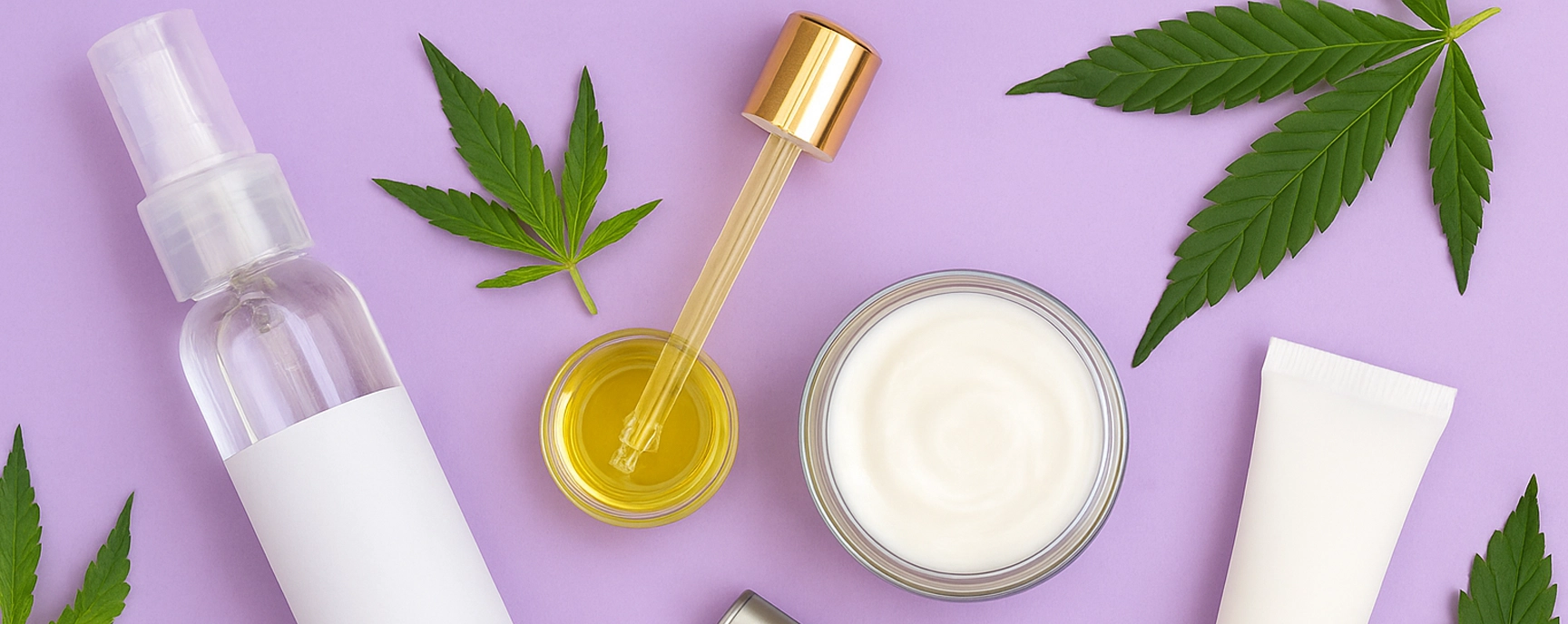 Cannabis-infused weed cream jars with dropper and hemp leaves on lavender background